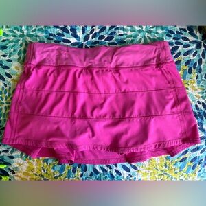Pace Rival Mid-Rise Skirt in the color Sonic pink size 10.